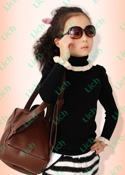 Водолазка с драпировкой рукавов и отделкой контрастными рюшами