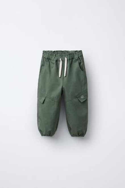 ZARA БРЮКИ-ПАРАШЮТЫ С ПРИНТОМ «РОМАШКИ», ХАКИ
