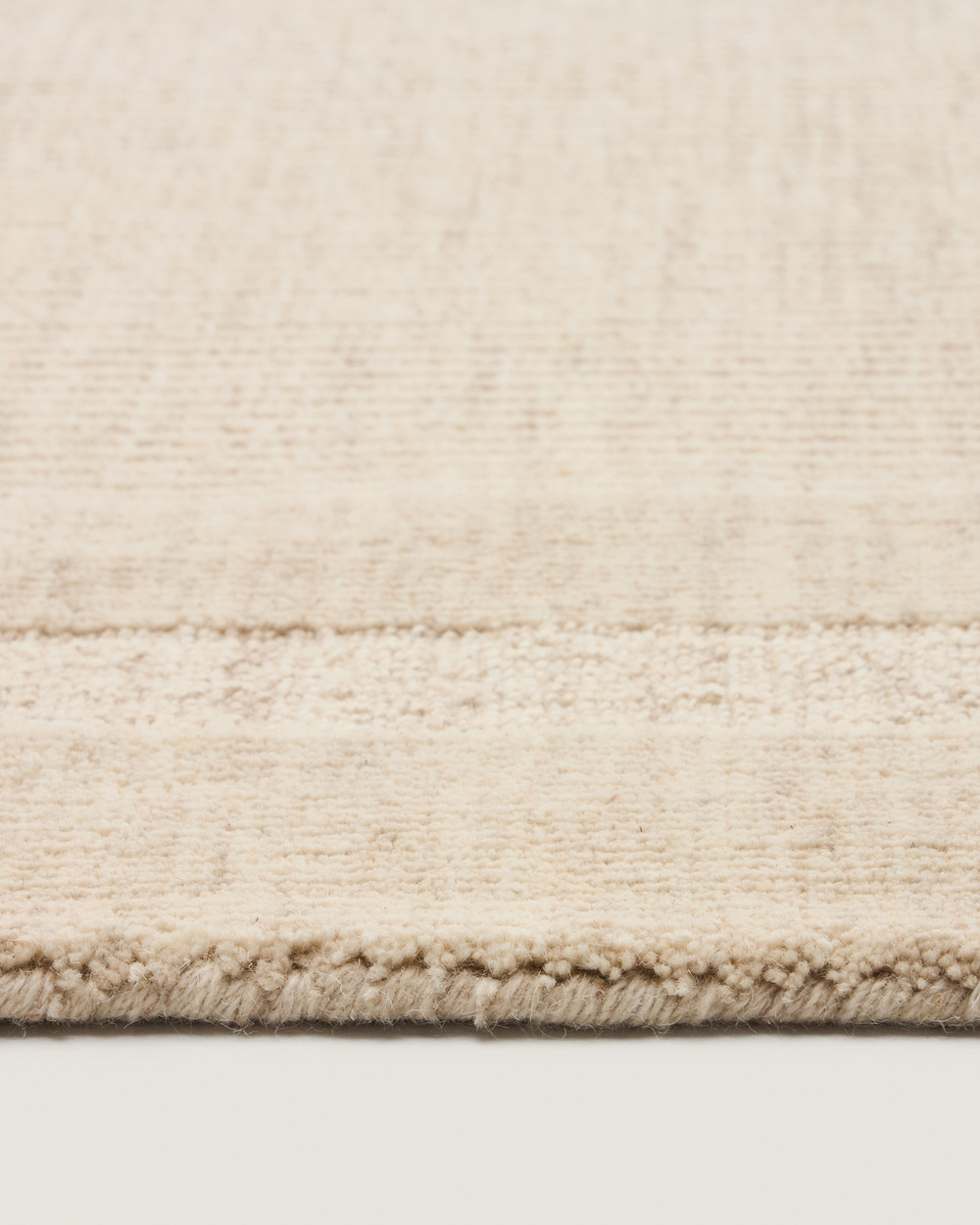 Жаккардовый шерстяной ковер Dalena в бежевую полоску 230 x 160 см