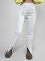 Джинсы Denim 3771 однотонные клеш от колена с разрезами спереди