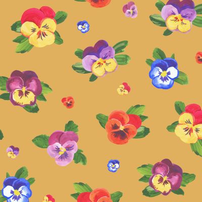 Разноцветные анютины глазки на желто-песочном