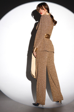 Костюм двойка из мерцающего трикотажа в бежевом оттенке