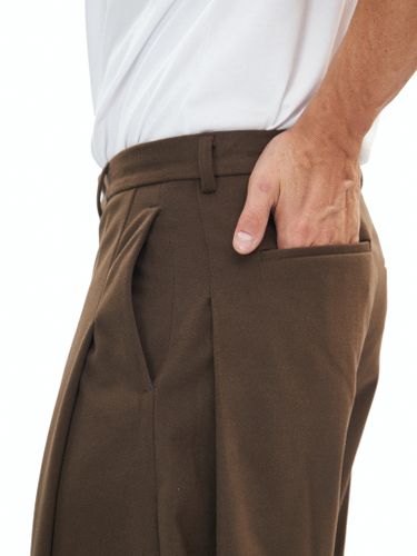 Коричневые брюки FORCE с защипами