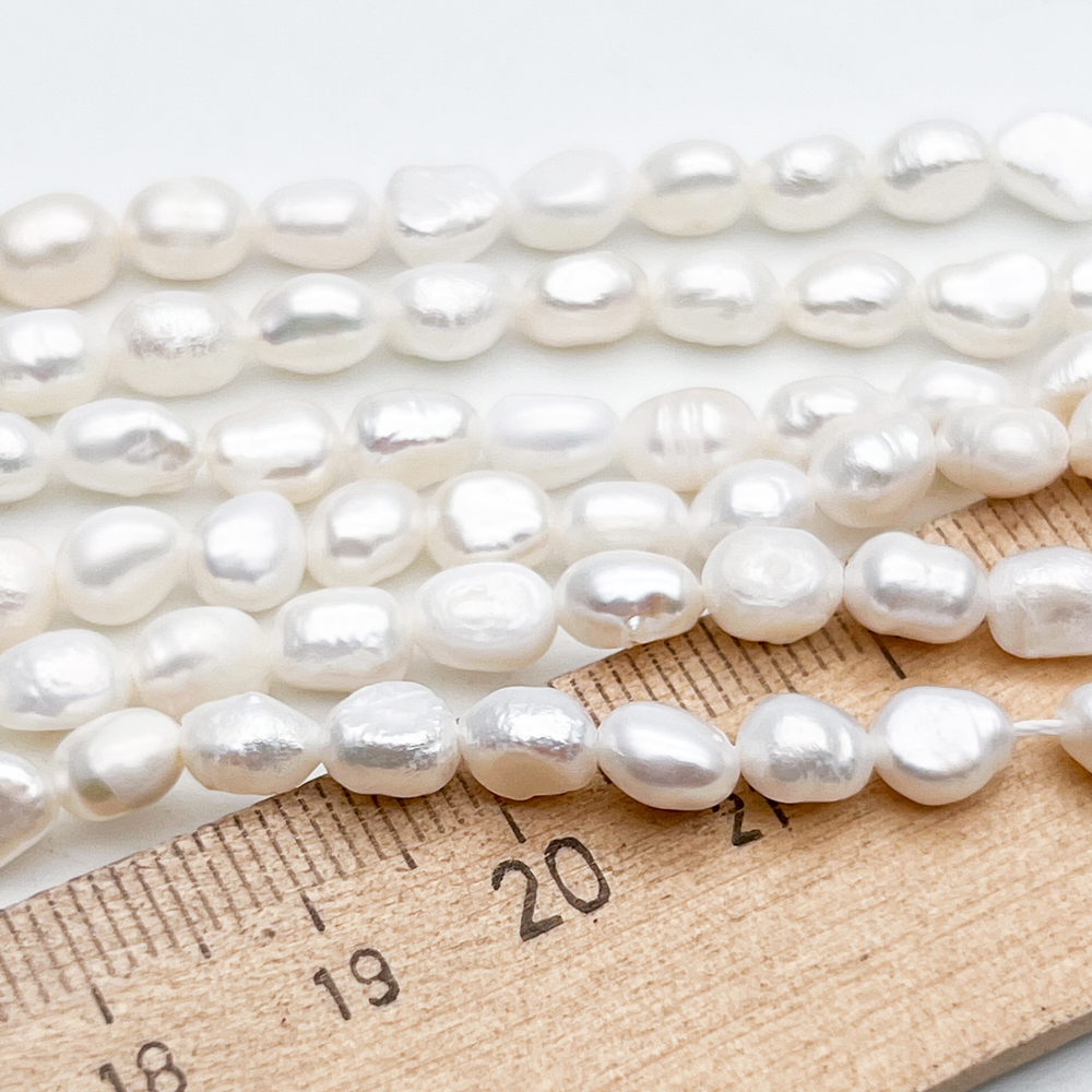 Жемчуг бусины, размер около 6,5-7*5-5,5 мм, цена за отрезок 17 см (1/2 нити)