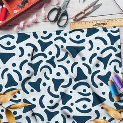 Ткань габардин синие треугольные узоры на голубом фоне