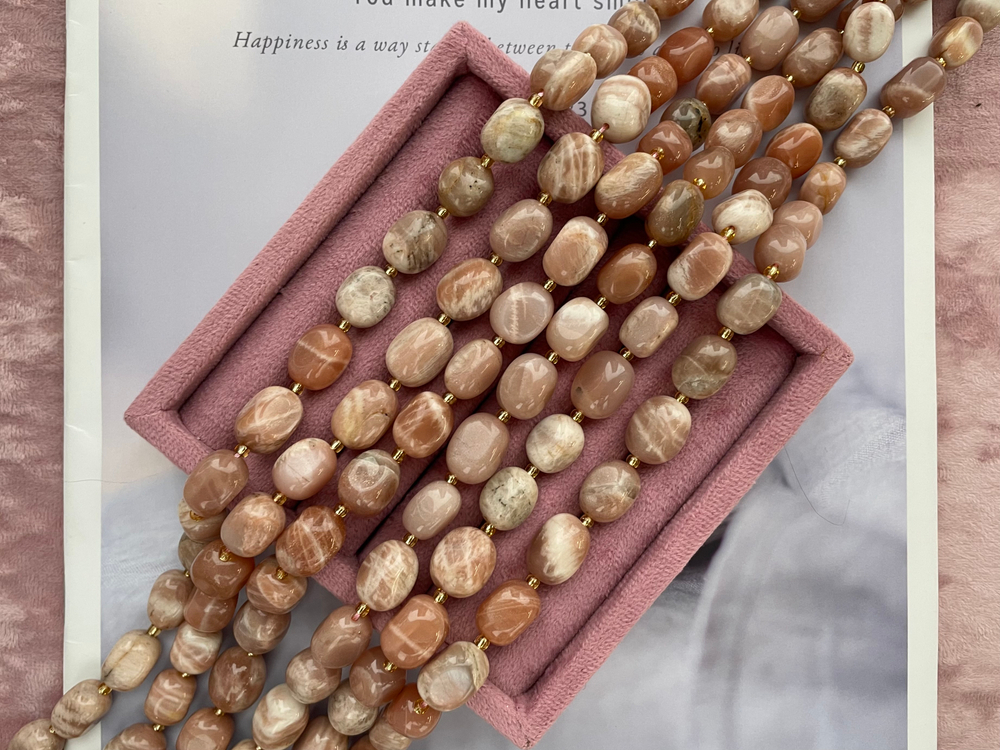 Нить бусин из солнечного камня 12-17мм (галтовка)