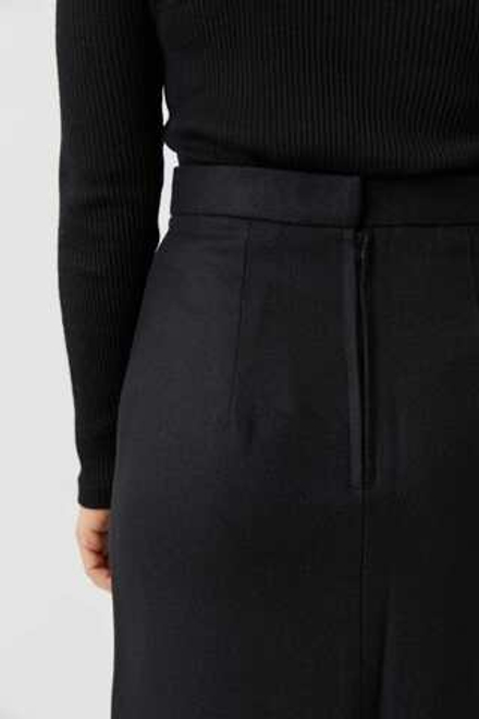 Юбка с разрезом из черной шерсти