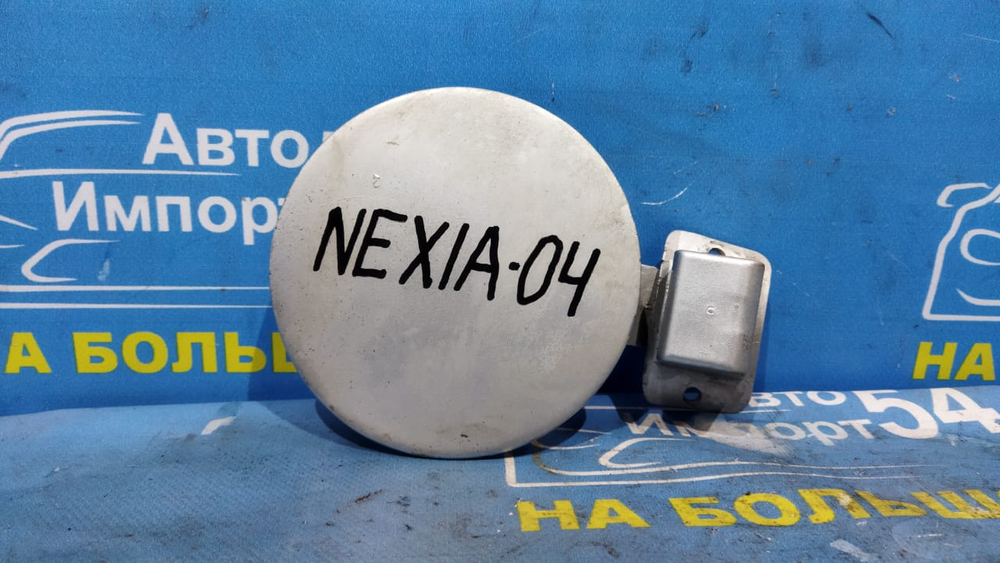 Лючок бензобака DAEWOO NEXIA 2001