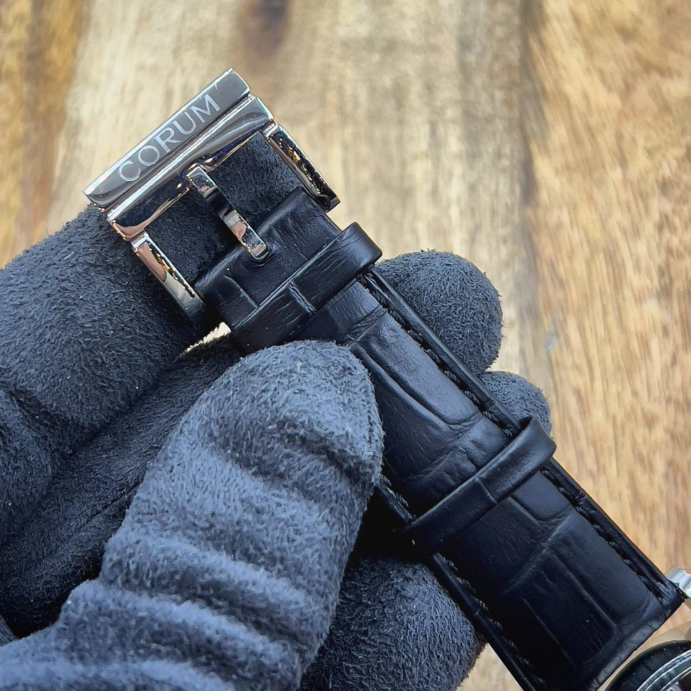 Часы Corum