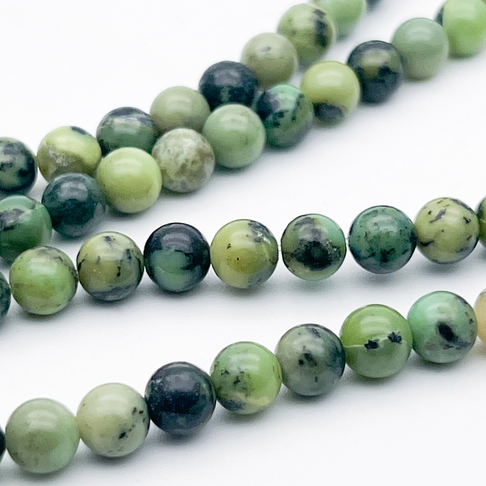 Серпентин бусины, диаметр около 6-6,1 мм, цена за 32-33 шт (1/2 нити)