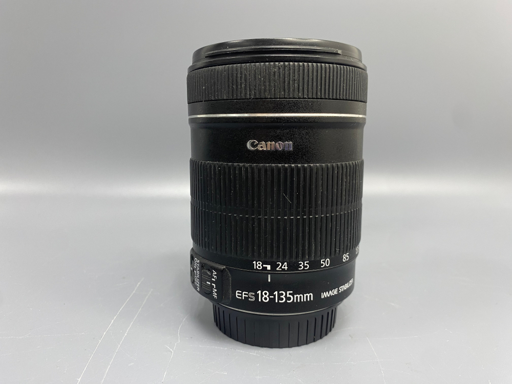 Canon EF-S 18-135mm 3.5-5.6 IS Пылинки