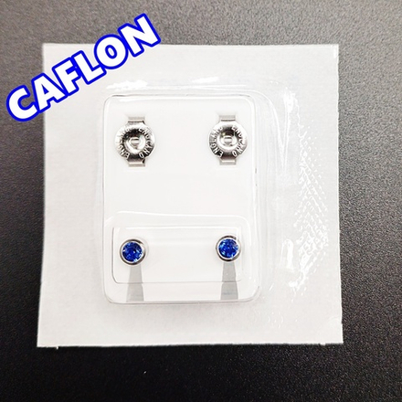 Серьги-гвоздики для прокола ушей под пистолет. CAFLON (Англия). Серебристые с синими ( Сентябрь)кристаллами