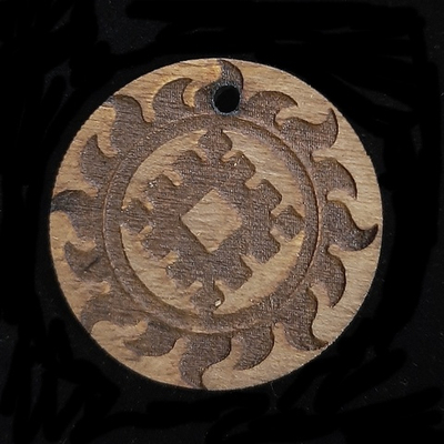 Славянский деревянный оберег "Репейник удачи". Материал береза. Цвет Полисандр. Длина шнура 50 см. Диаметр 3 см