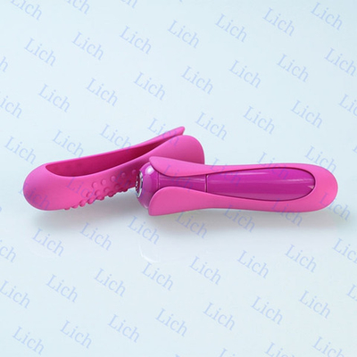 Розовый минивибромассажер с двумя сменными насадками Io Key