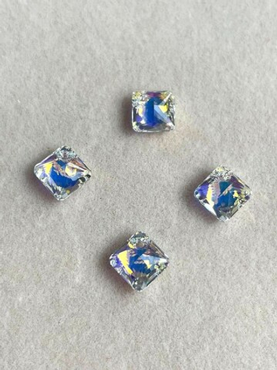 6431-9 AB Кристалл "Ромб" 9мм прозрачным с теплым отливом