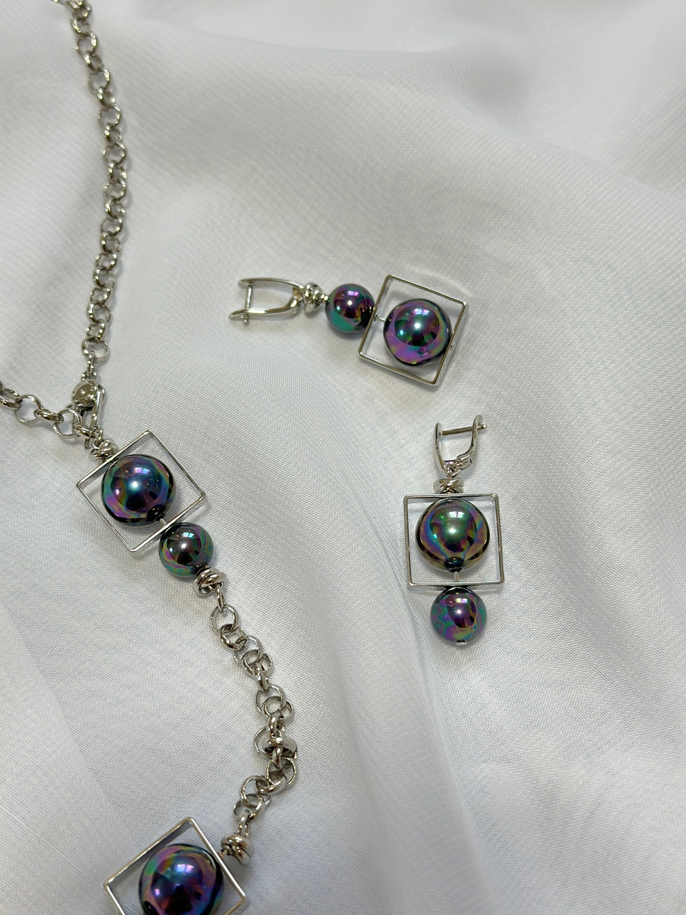 Серьги асимметричные miss Di серебро с темным бензиновым жемчугом Майорка