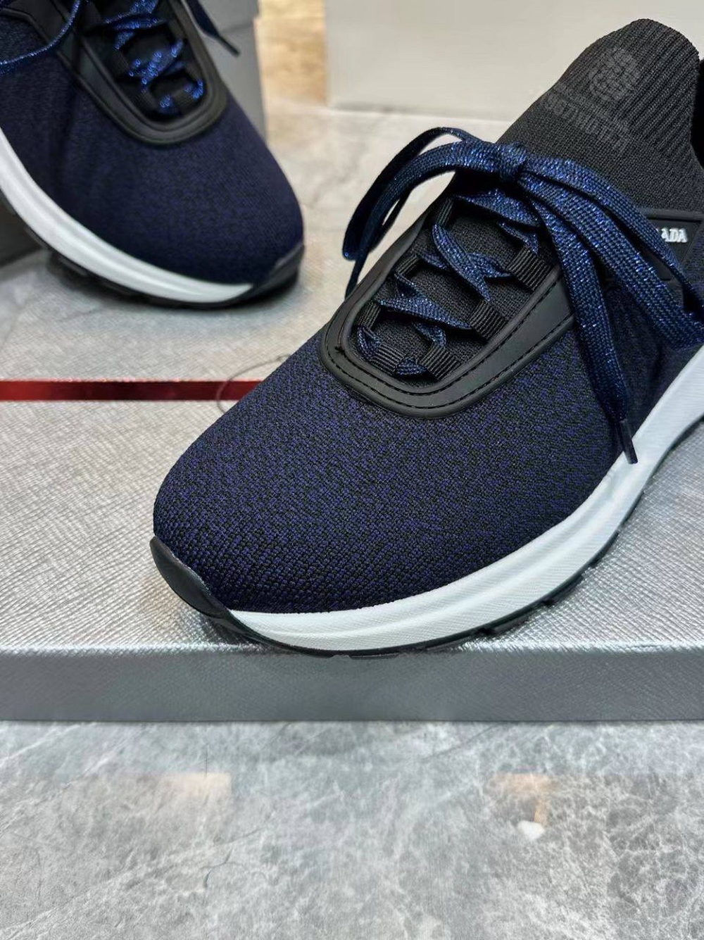 Кроссовки Prada