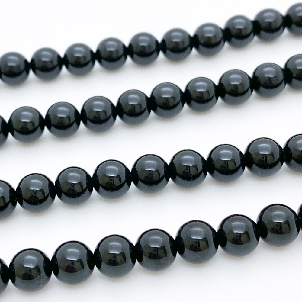 Турмалин черный бусины (шерл), диаметр 5,6-5,9 мм, цена за 16-17 шт (1/4 нити)