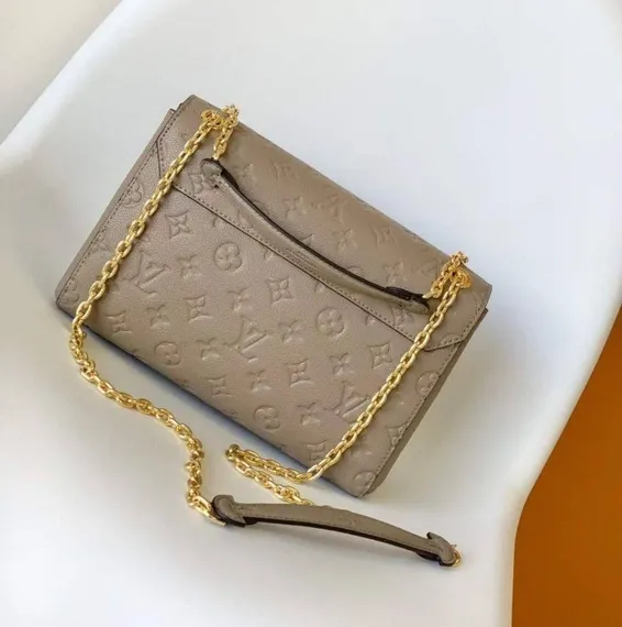 Сумка Louis Vuitton Vavin PM бежевый