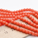 Коралл тонированный шар бусины, размер около 4-4,2 мм, цена за отрезок 19 см (1/2 нити)