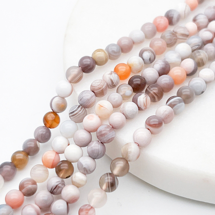 Агат Ботсвана розовый бусины, диаметр около 4,7 мм, цена за отрезок 19 см (1/2 нити)