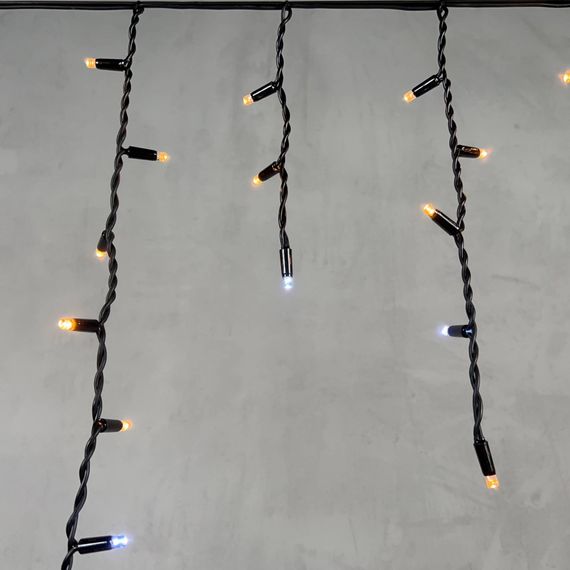 Светодиодная бахрома с колпачком 3,1*0,5 м., 120 экстра теплых белых LED ламп, мерцание, каучуковый черный провод, LTC (LL120BLW-1-2EWW)