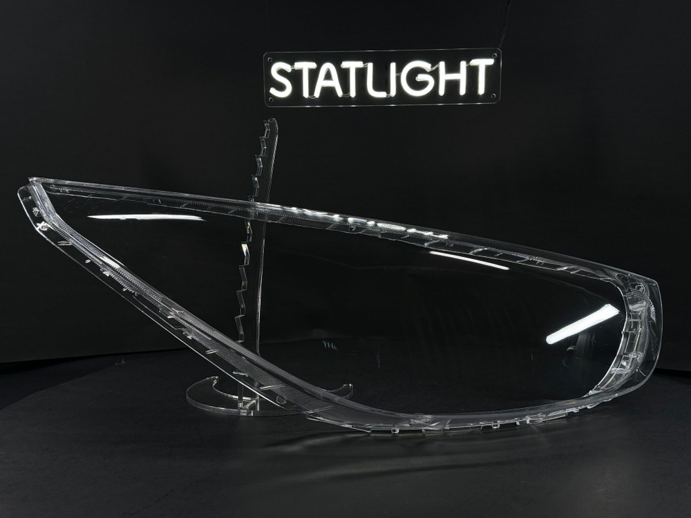 Правое стекло фары Hyundai Tucson 2 IX35 2009-2015