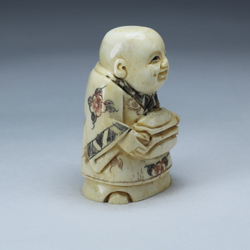 Нэцкэ Монах со свитком