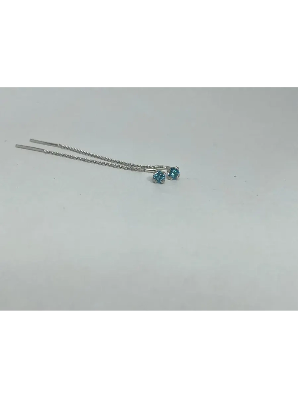 Серебряные серьги протяжки c топазом swiss