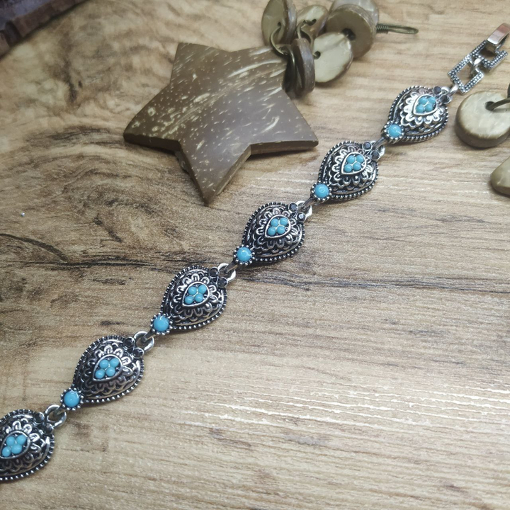 Браслет Vogue Капля стразы графитовые бусинки голубые металл серебристый на красном бархате