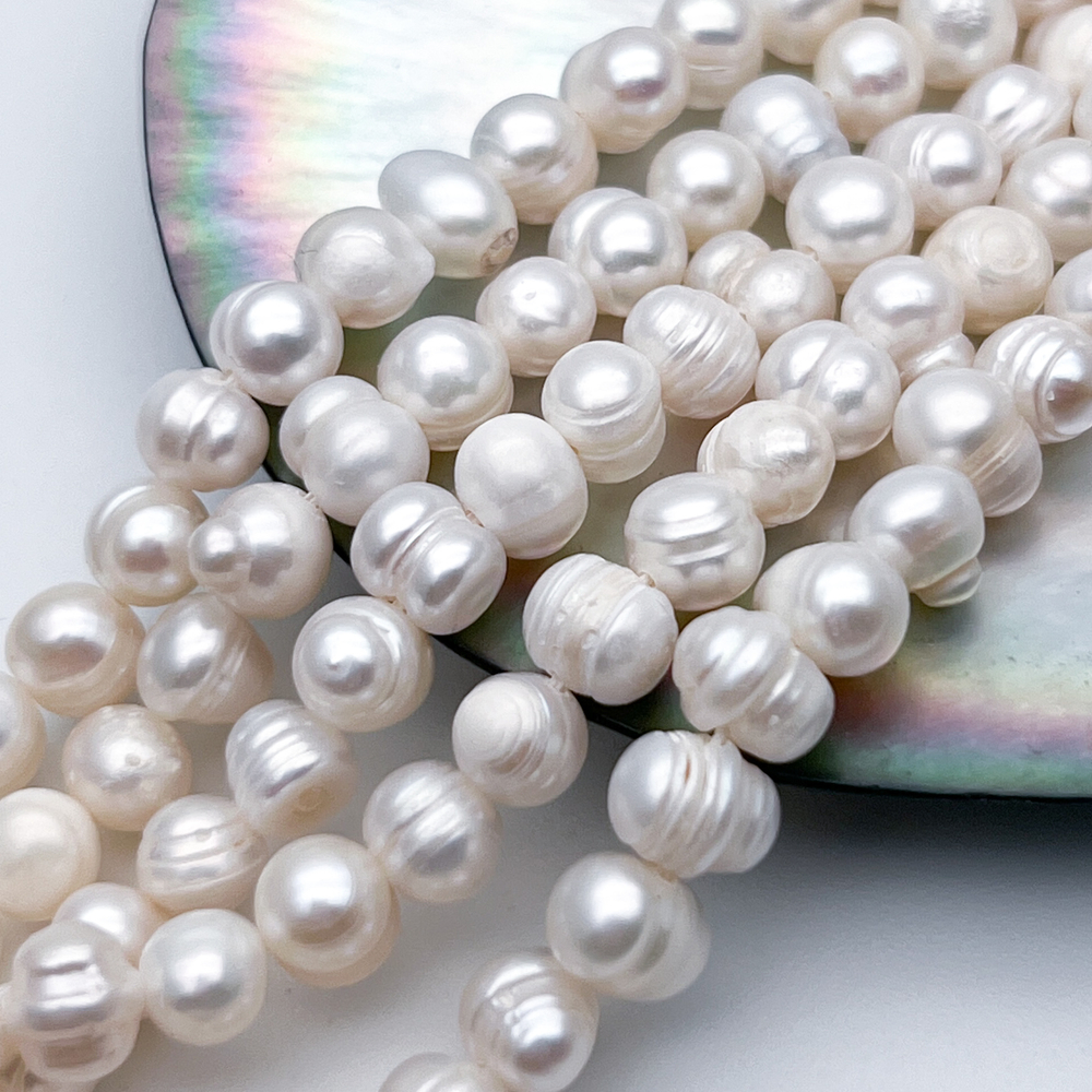 Жемчуг, размер около 7,8*6 мм, цена за нить 34 см