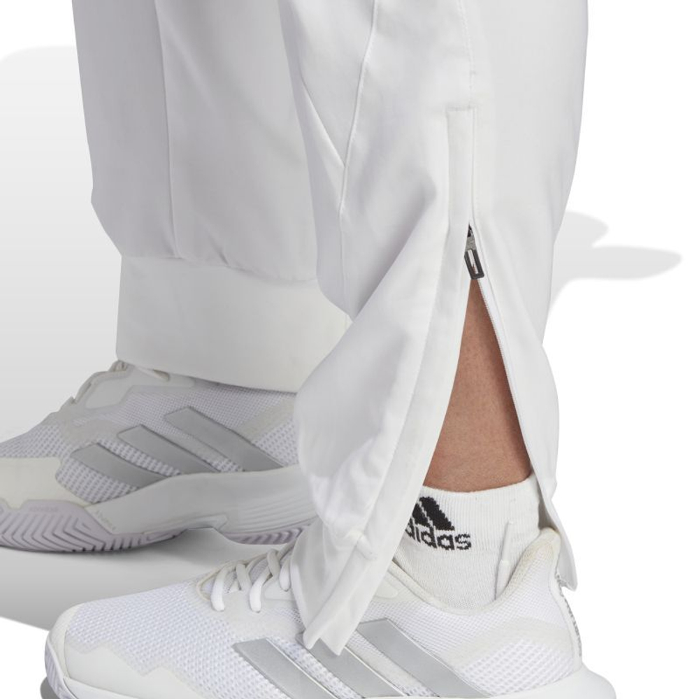 Женские теннисные брюки Adidas Woven Pant Pro - белый