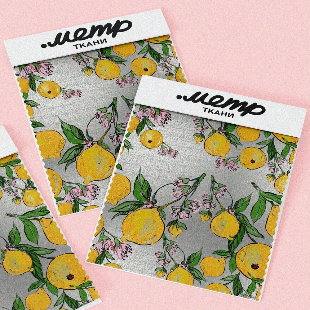 Ткань кулирная гладь лимоны на сером