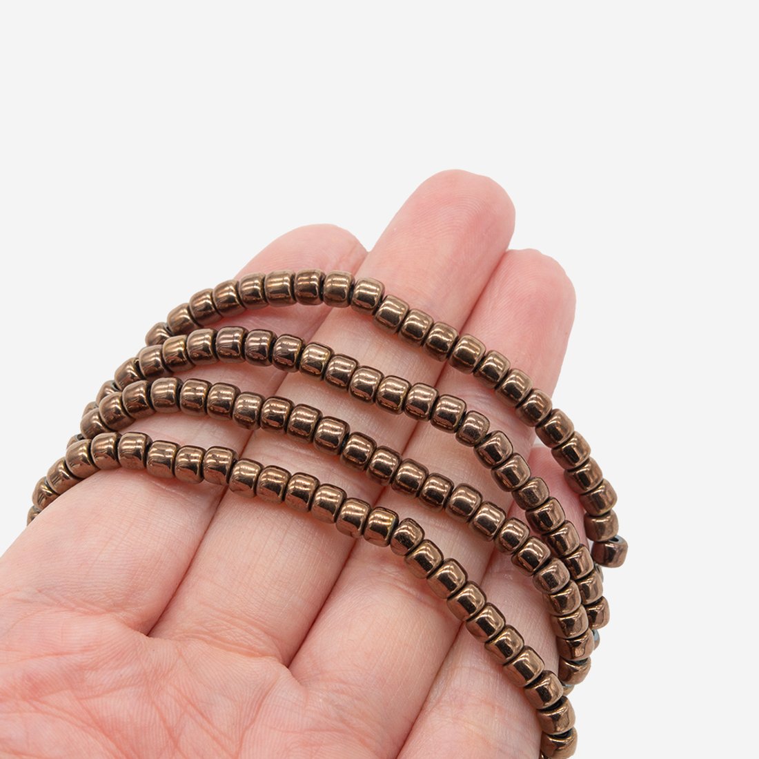 Гематин (гематит), оттенок "Бронза", бочонок 3*4мм