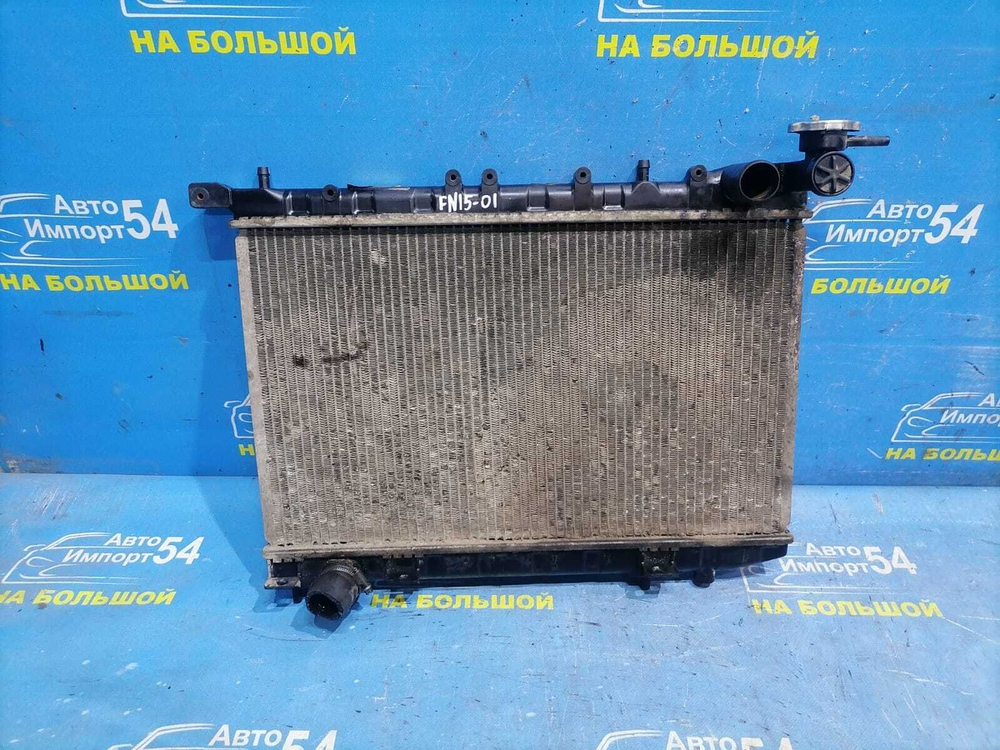 Радиатор двигателя NISSAN PULSAR 1997