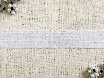 Нитепрошивная кромка клеевая по долевой, ш. 2 см.