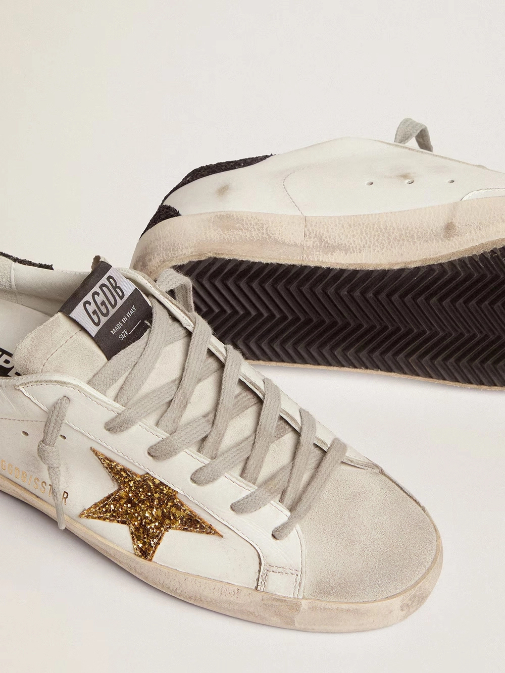 Super-Star in nappa leather with gold glitter star and black glitter heel tab