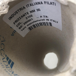FRIZZANTE - Industria Italiana Filati; 70% вискоза, 15% металлизированный люрекс, 15% п/а; 3500м/100гр; col. 2102, цвет: серебро на светло-бежевой нити