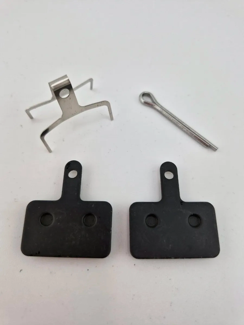 - Тормозные колодки дисковые для велосипеда и самоката