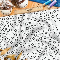 Ткань кулирная гладь мелкие геометрические фигуры на бежевом фоне