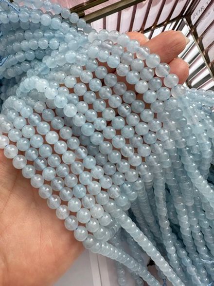 Нить бусин из тонированного кварца 6,5мм, гладкие