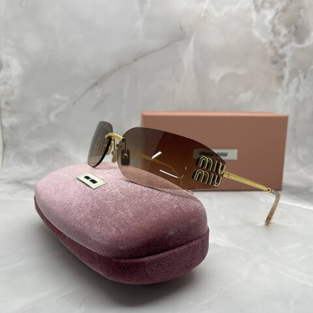 Солнцезащитные очки MIU MIU