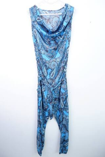 Комбинезон пестрый, визуально на 44 размер