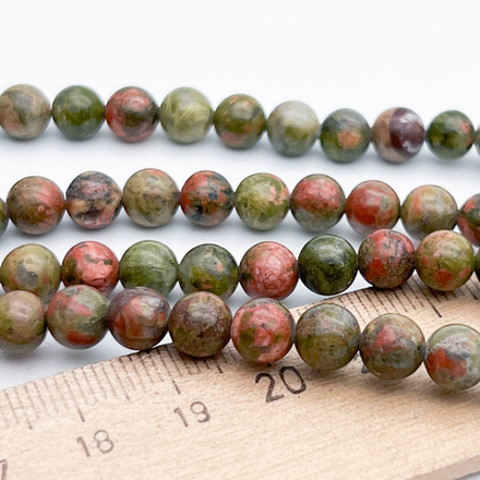 Унакит бусины, диаметр 6,4-6,6 мм, цена за 27-28 шт (1/2 нити)