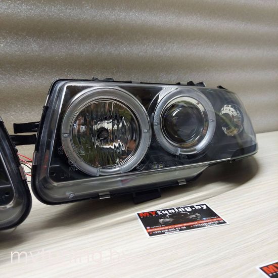 Передние фары Opel Astra F angel eyes black