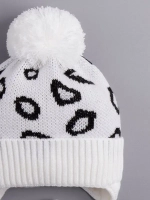 Шапка для девочки на завязках на осень