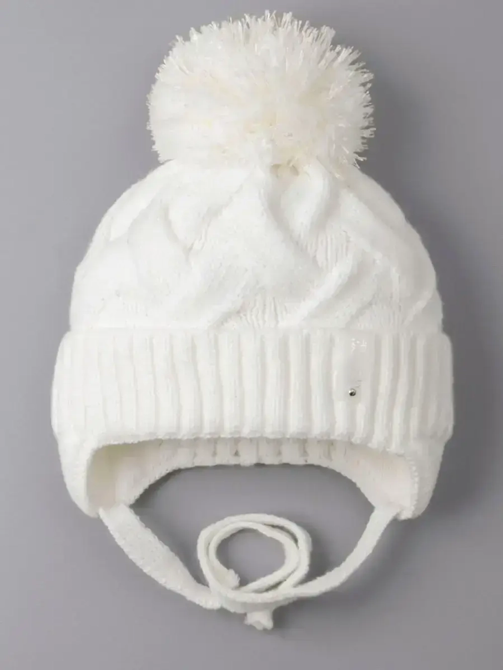 Шапка для девочки на завязках на осень