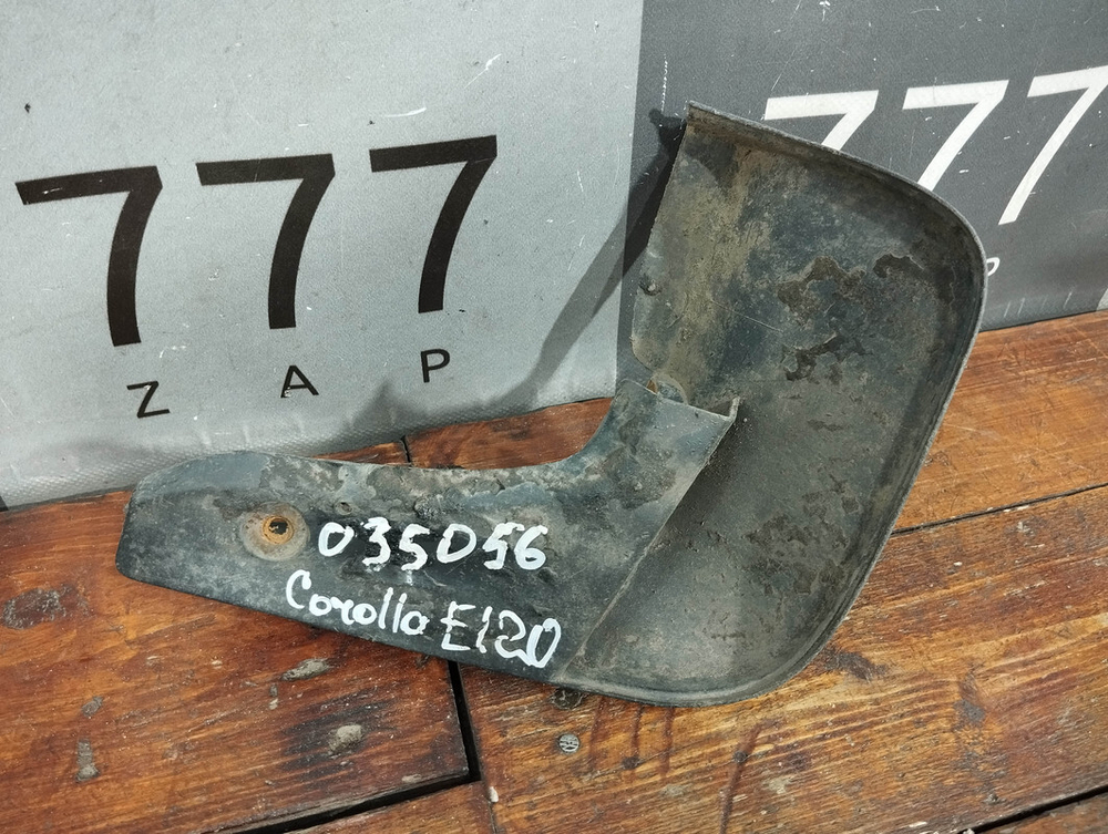 Брызговик задний правый Toyota  Corolla (E120) 00-07 Б/У Оригинал 7662502120
