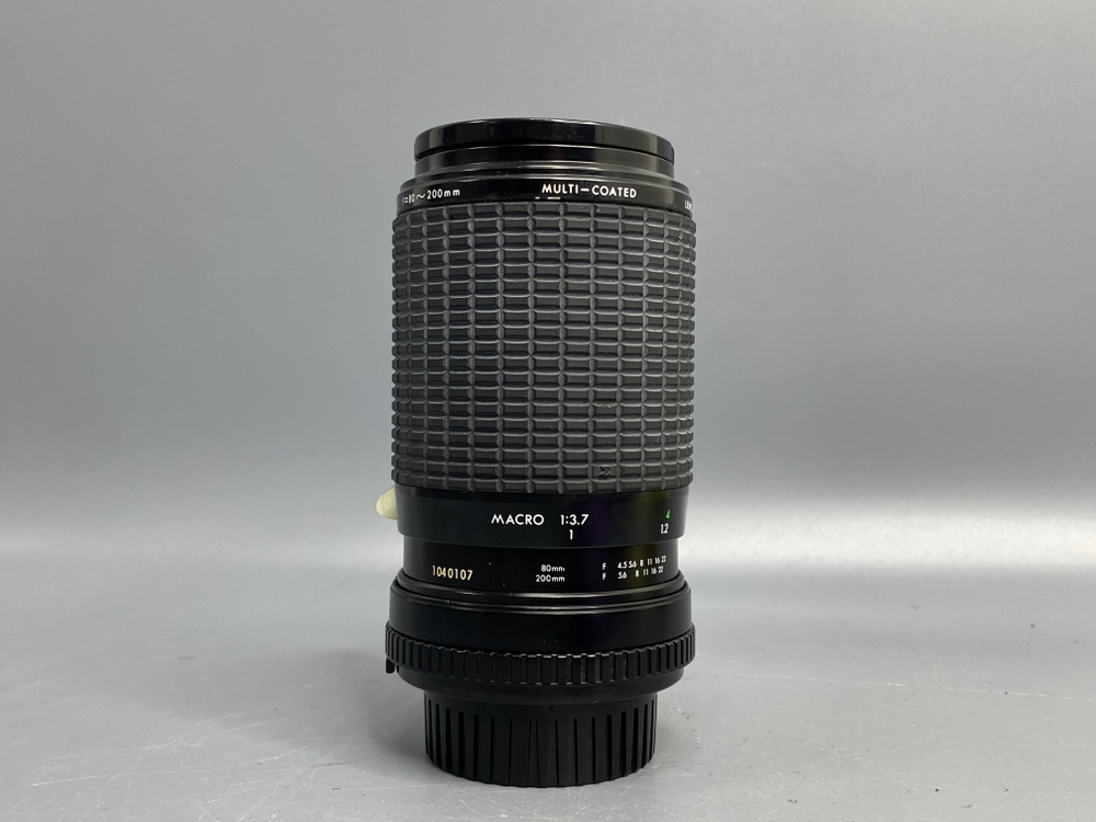 Sigma 80-200mm f/4.5-5.6 микроточки под передней линзой