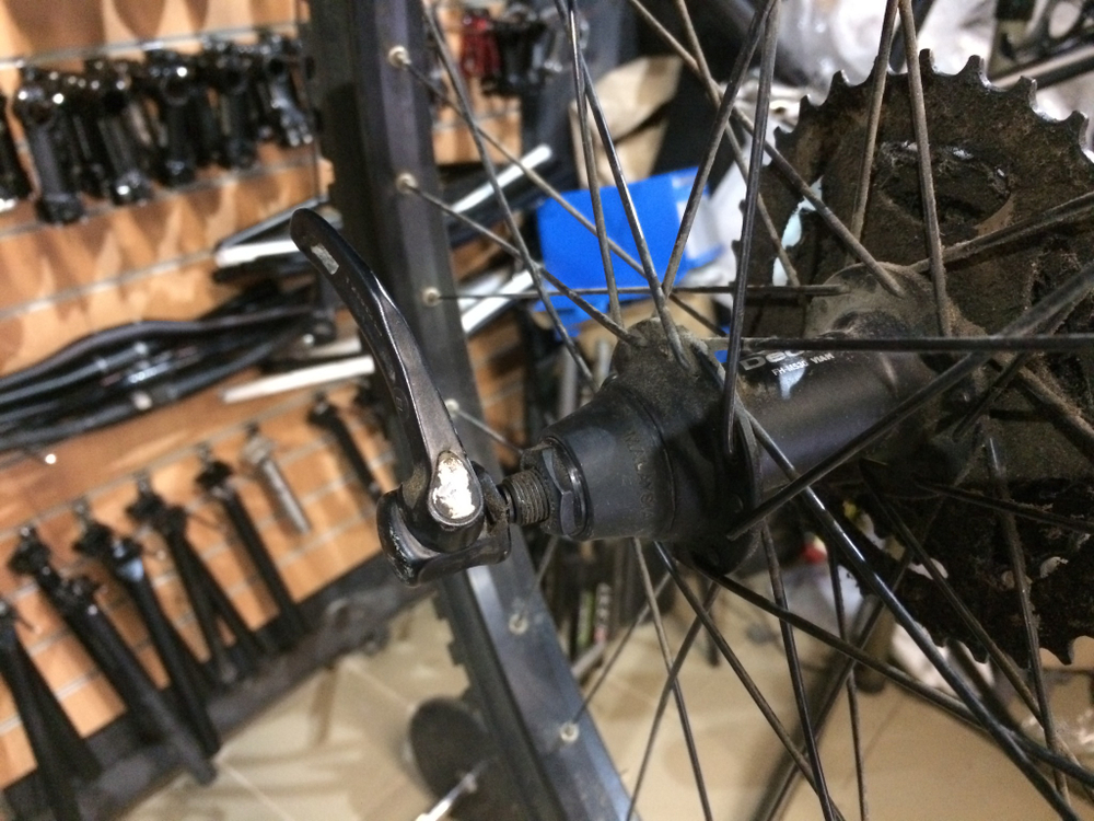 Колесо заднее 26 Sun Rims Rhyno Lite / Shimano Deore M350 135×QR + кассета 8ск 11-34t + покрыка WTB